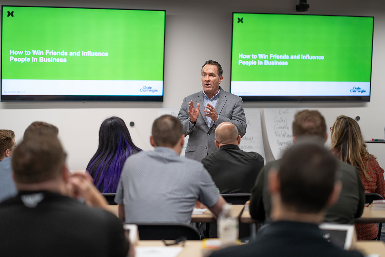 2024 FLN Professional Development Program Participants Announced - People listen to speaker in classroom setting