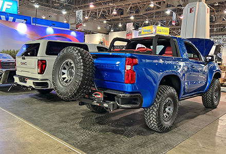 Flat Out Autos SEMA Show booth GMC and Chevrolet