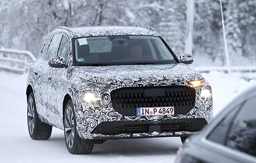 Audi Q7 prototype driving on winter road