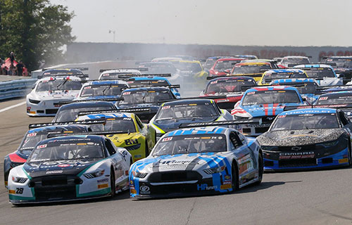 Trans Am cars turning at Watkins Glen